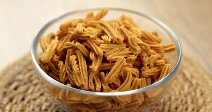Crispy soya stick snack served in a bowl, healthy high-protein Indian namkeen for tea time or evening munching