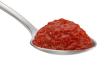 Tomato paste in spoon isolated on white background
