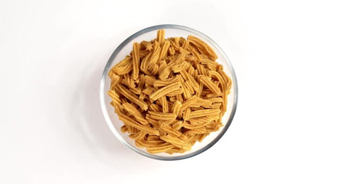 Crispy soya stick snack served in a bowl, healthy high-protein Indian namkeen for tea time or evening munching