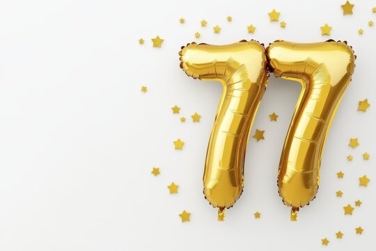 Celebratory golden 77 balloon display with star accents on white background
