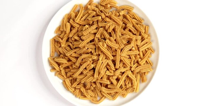 Crispy soya stick snack served in a bowl, healthy high-protein Indian namkeen for tea time or evening munching