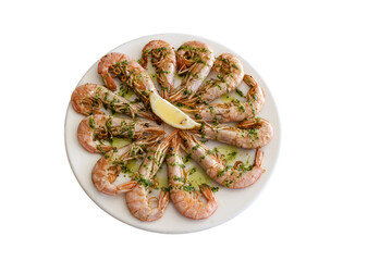 Shrimp appetizer with parsley and lemon on a white plate