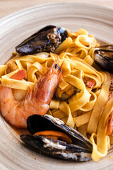 Seafood pasta with shrimp and mussels on a plate