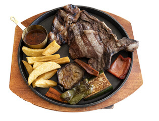 Grilled beef steak with french fries and vegetables