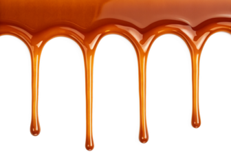 Melted caramel syrup dripping down border isolated on a transparent background.