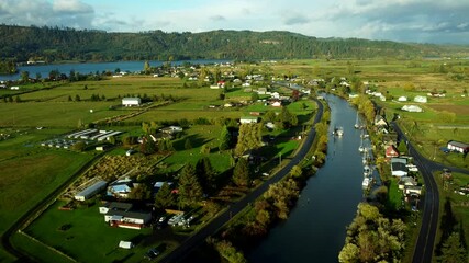 US, WA, Cathlamet, 2025-10-25 - Drone view of Welcome Slough at dawn on a clear fall day