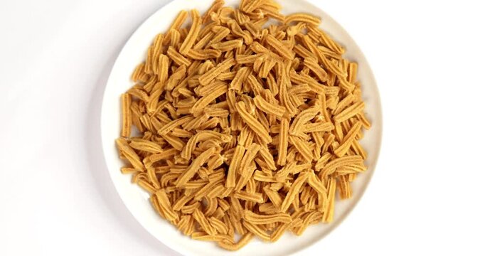 Crispy soya stick snack served in a bowl, healthy high-protein Indian namkeen for tea time or evening munching