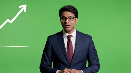 An engaging business presenter explains market growth strategies and economic trends with interactive charts on a chroma key screen a clear and