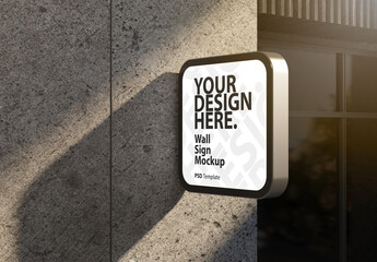Square signboard lightbox Mockup on the wall of storefront