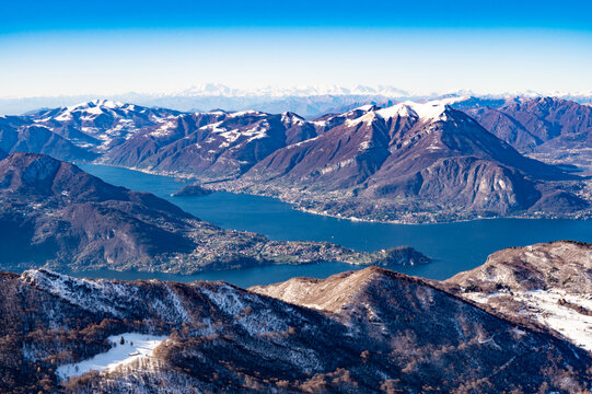 Panorama of Lake Como, with Bellagio, Tremezzina, and Villa Balbianello, photographed from the Alpe di Cainallo, in winter with snow.