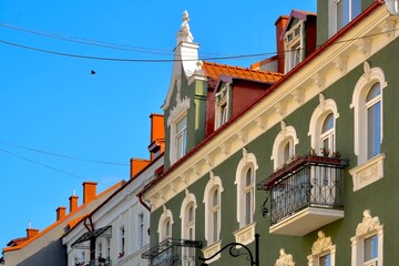 Buildings in the city in the summer against the sky