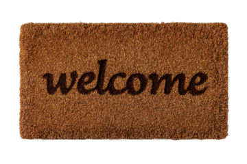 Welcome doormat made of natural coir fiber, isolated on a clean background.