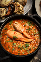 Portuguese traditional food Crab soup risotto meal on restaurant table in lisbon