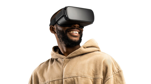 Black man wearing virtual reality headset smiling and looking into distance, concept for immersive technology and entertainment experiences for VR gaming and simulation
