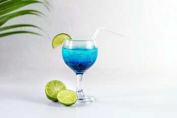 Blue Hawaiian Drink with lime, Blue hawaii cocktail on white  background