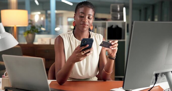 Online shopping, card and woman with smartphone, office or browsing for discount on website at night. Working late, employee and black person with tech for cyber Monday, ecommerce and scroll for sale