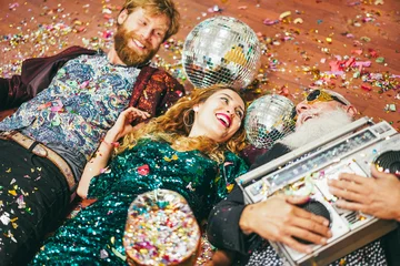 Fotobehang Muziek Multi generational crazy people celebrating new year's eve party together - Fest, fun and event concept - Soft focus on center girl face  © DisobeyArt