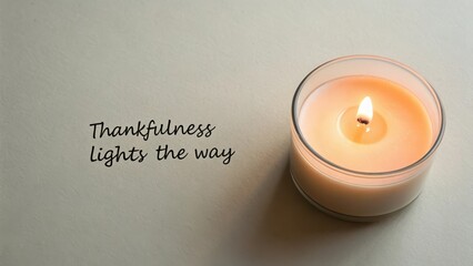 Burning Candle with Text on Neutral Surface