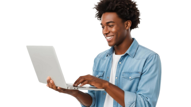 Young Black man smiling while using laptop - Powered by Adobe