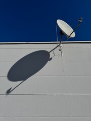 Satellite dish is mounted on a building