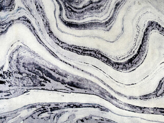 Graphic background in abstract illustrated cloud, brushed, and wavy pattern. Painted in blue, brown, grey, and beige color. Random grunge and dirt carpet rug seamless background texture