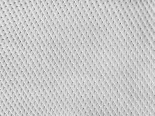 Close up of white fabric with net lattice pattern. Suitable for wallpaper, upholstery, textile, and drapery. Seamless background texture.