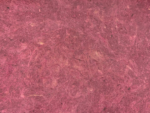 Decorative red maroon washed paint on a surface. Random limestone red marroon washed paint with grunge, and dirt pattern. Seamless background texture.      