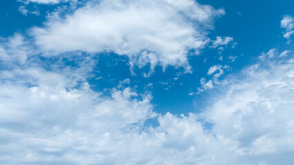 Clouds rising against a blue sky. Ideal for backgrounds.