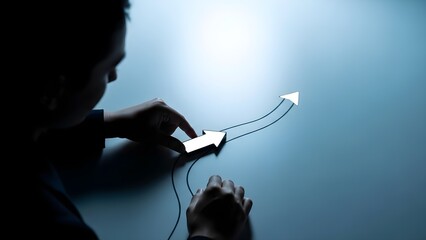 Businessman setting the path for growth with a glowing arrow chart on a dark background, illustrating strategy, progress, future planning, and providing daily encouragement for reaching new success m