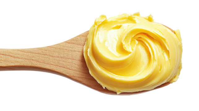 Butter dollop on wooden spoon isolated on a transparent background
