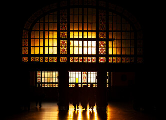 Fototapeta premium Kadıköy, Istanbul, Türkiye. The entrance of the historic Haydarpasa train station at sunset