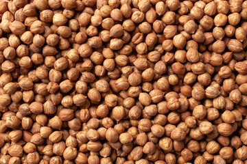 Shelled hazelnut, top view, background image