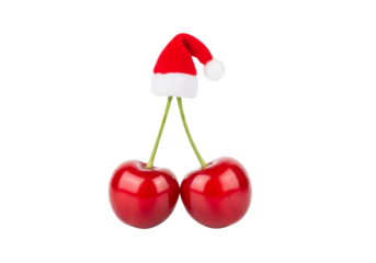 Sweet Red Cherries Wearing a Festive Miniature Santa Hat for Christmas Holidays Isolated on White