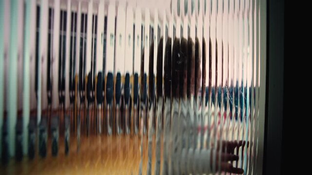 Toddler crying behind rippled glass barrier with darkened reflection suggesting childhood trauma internalized fear emotional disconnection depression and overwhelming vulnerability