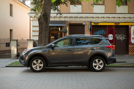 Ivano-Frankivsk, Ukraine - 22 June 2024: Toyota RAV4 a compact crossover SUV, side view. Car parking on street