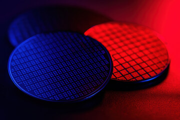 Glowing semiconductor wafer silicon wafer microchip wafer blue and red lighting semiconductor grid cleanroom technology microfabrication electronic component polished surface reflective wafer