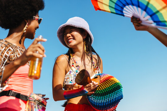 Group of friends dancing together at Brazilian carnival