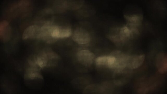 Abstract Warm Bokeh Light Leaks Overlay on Black Background