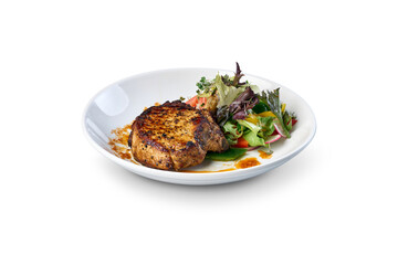 Grilled pork chop with fresh salad on transparent background