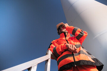 Engineers are inspecting wind turbines to generate electricity.