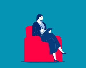 Businesswoman sitting in armchair writing paper document