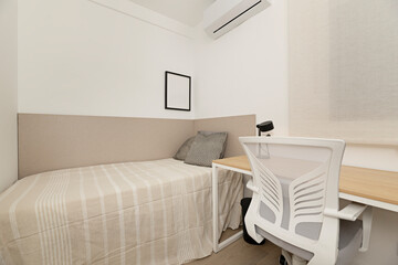  Minimalist bedroom with a floating designer bed, cork bedside tables, and adjustable color-changing LED lighting