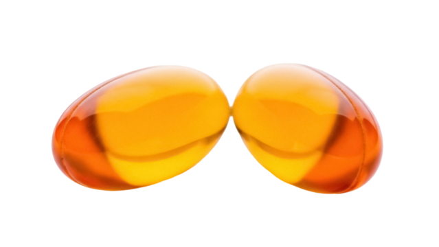 Two golden fish oil capsules isolated PNG on transparent background, omega-3 supplement for health and nutrition