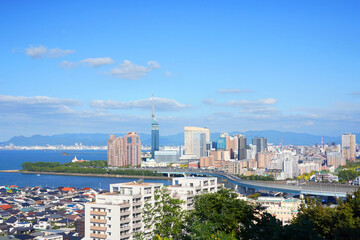 Scenic Skyline of Fukuoka City with Blue Sky and Ocean