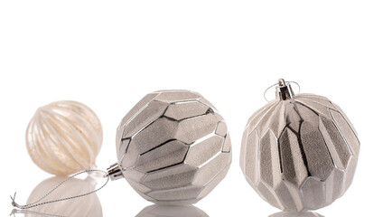 Glass Christmas balls isolated on white background, close-up.