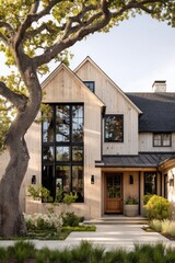Modern house design with large windows and wooden accents located in a residential area surrounded by trees during daytime
