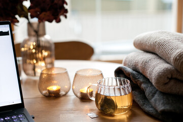 Cozy lazy day working with laptop in the morning.