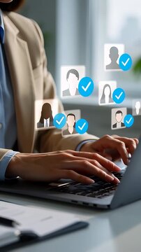 Close up of businesswoman hands typing on a laptop with animated profile avatars and blue checkmarks floating up, illustrating successful recruitment and digital verification concepts