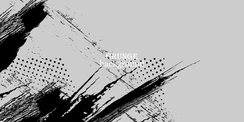 Abstract gray background with bold black grunge brush strokes and halftone dot accents.