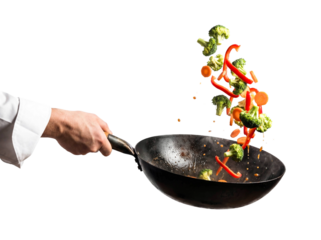 Chef hand tossing vegetables stir fry frying pan isolated white background png transparent cutout cooking healthy food vegan vegetarian broccoli pepper carrot motion action culinary studio shot 